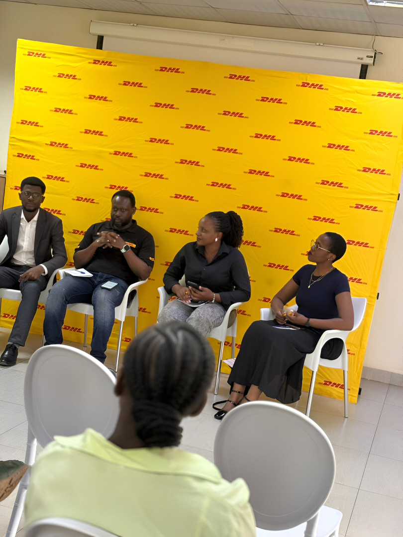 Woman presenting on whiteboard with sticky notes